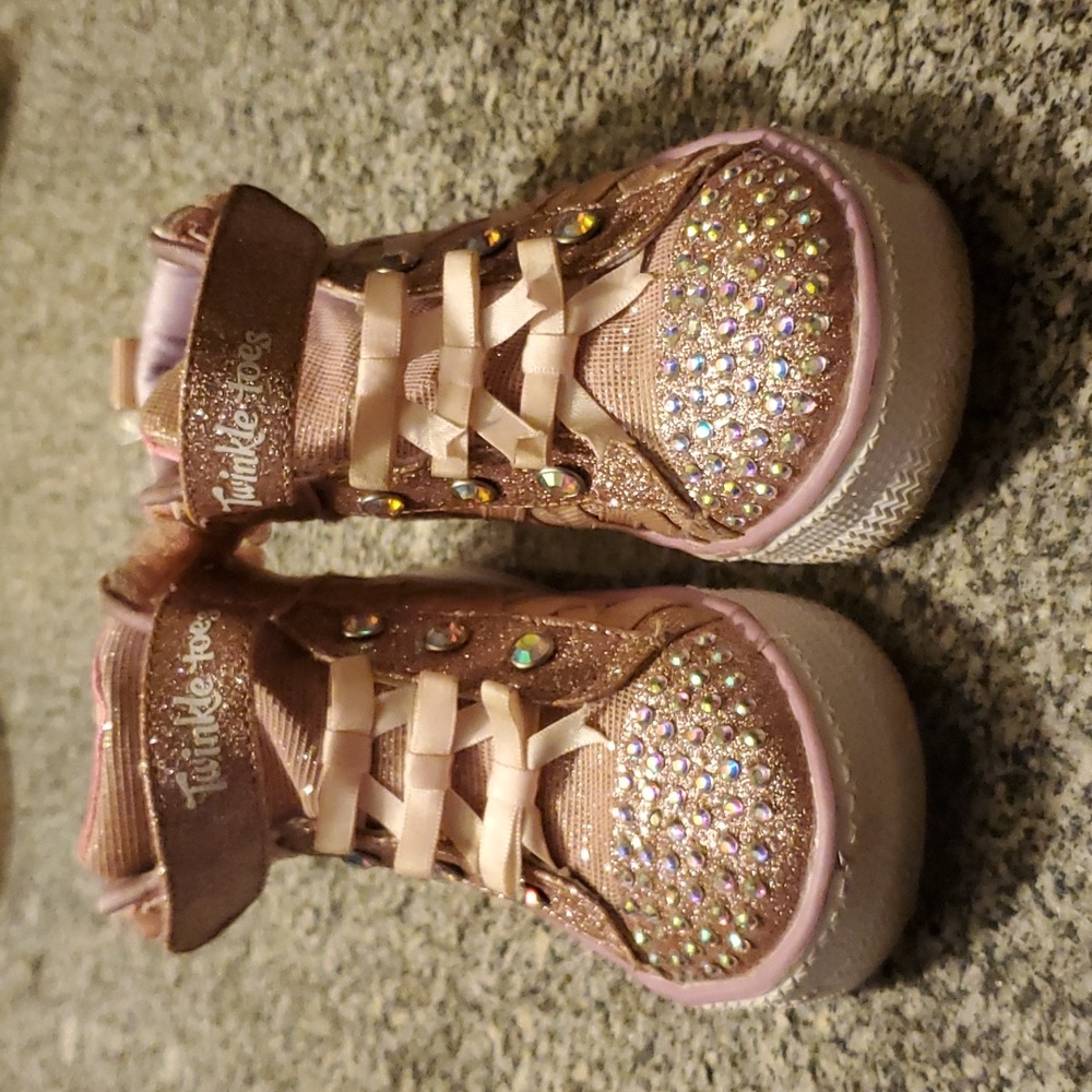 Girl's pink high top light up tennis shoes